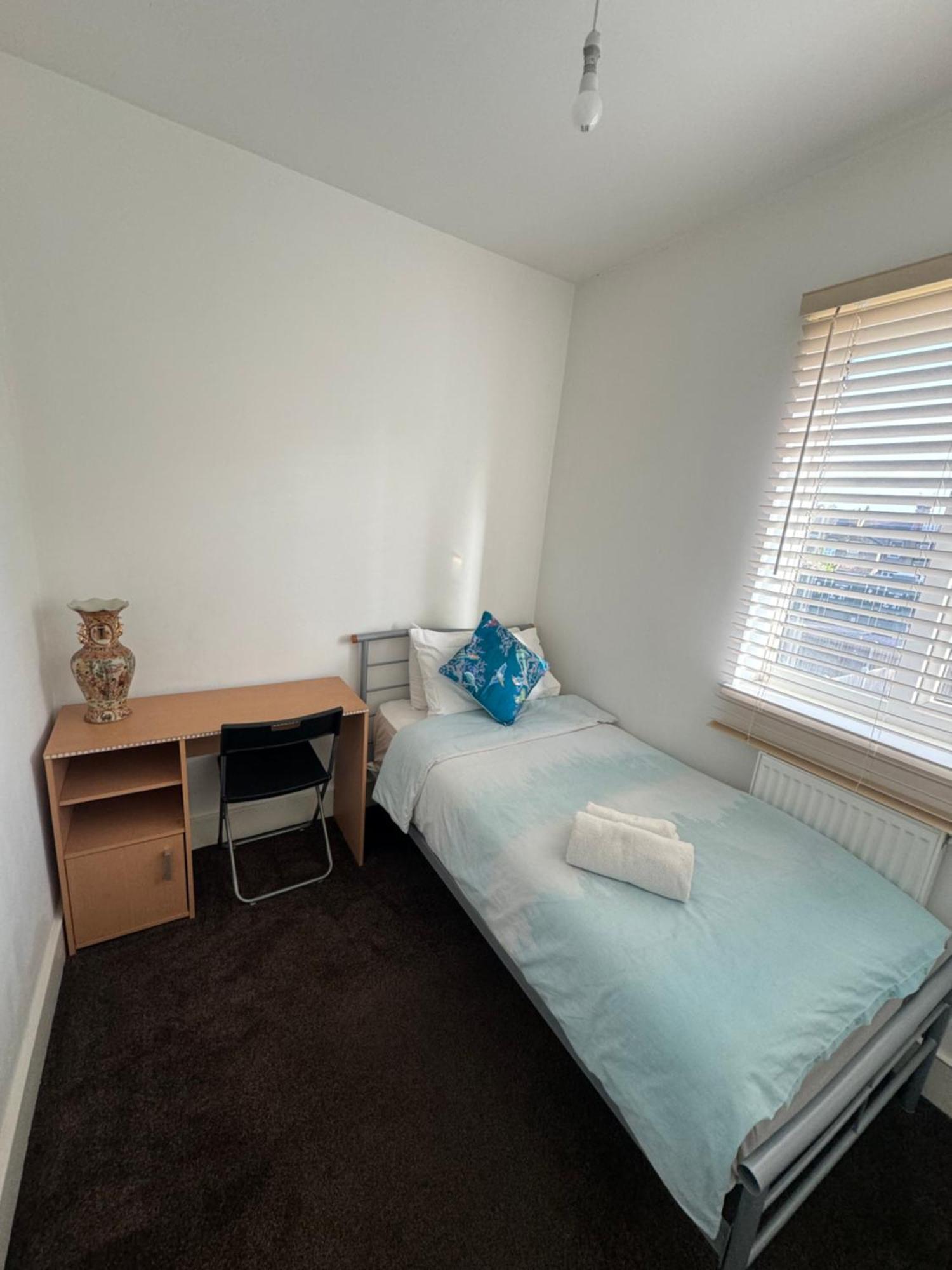 Single Room with Shared Shower and Toilet